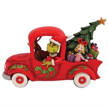 Grinch in red truck H:15 cm.